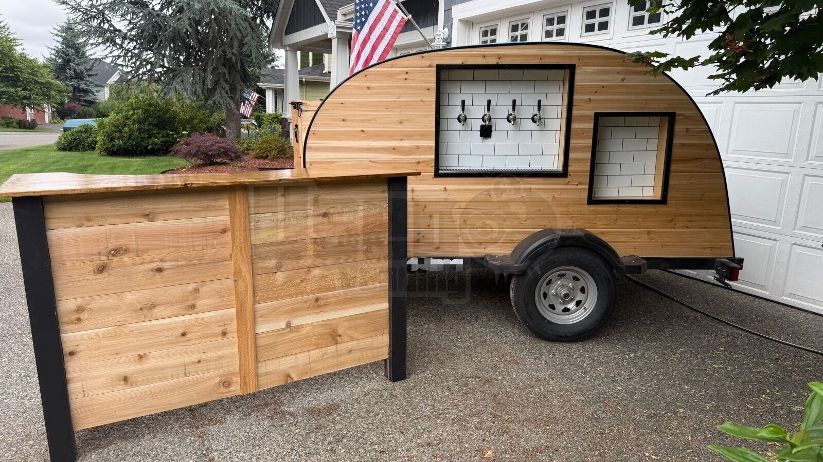 Cedar mobile bar trailer with serving bar