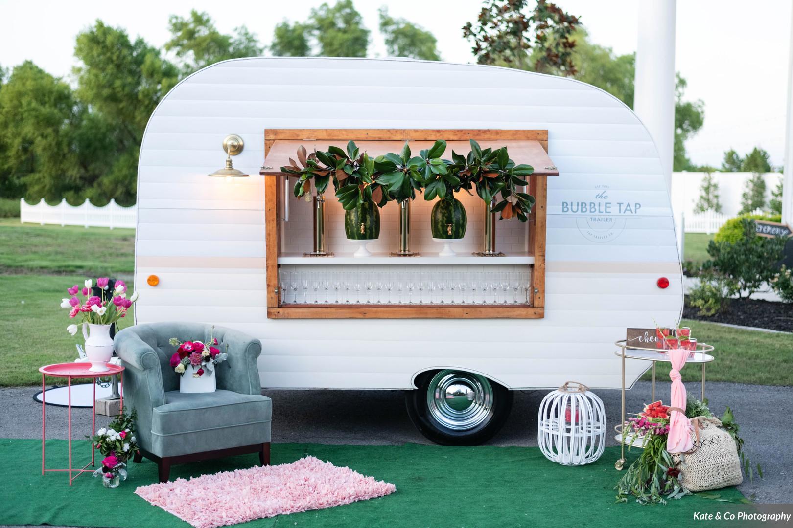 Bubble Tap bar trailer with floral decor